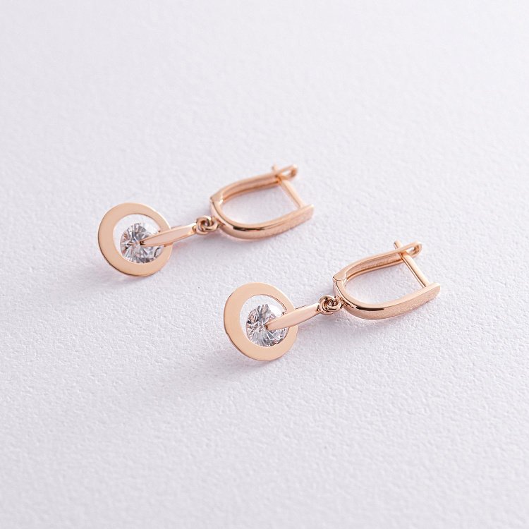 Золоті сережки "Крапельки" з фіанітами с07563 від ювелірного магазину Онікс