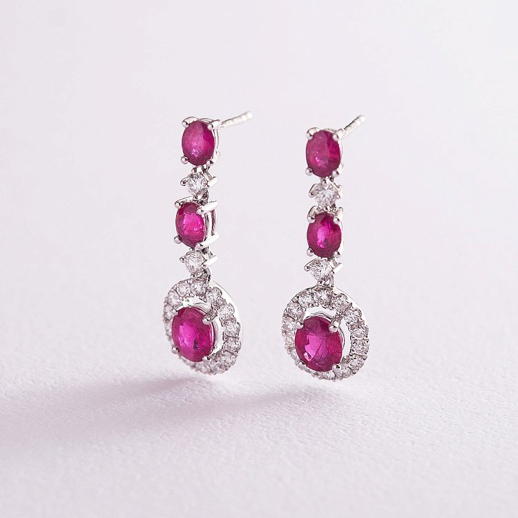 Золоті сережки з рубінами і діамантами DE3735Rcha від ювелірного магазину Онікс