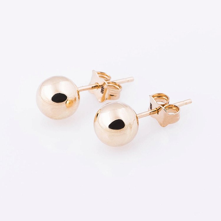 Золоті сережки - пусети кульки с04897 від ювелірного магазину Онікс