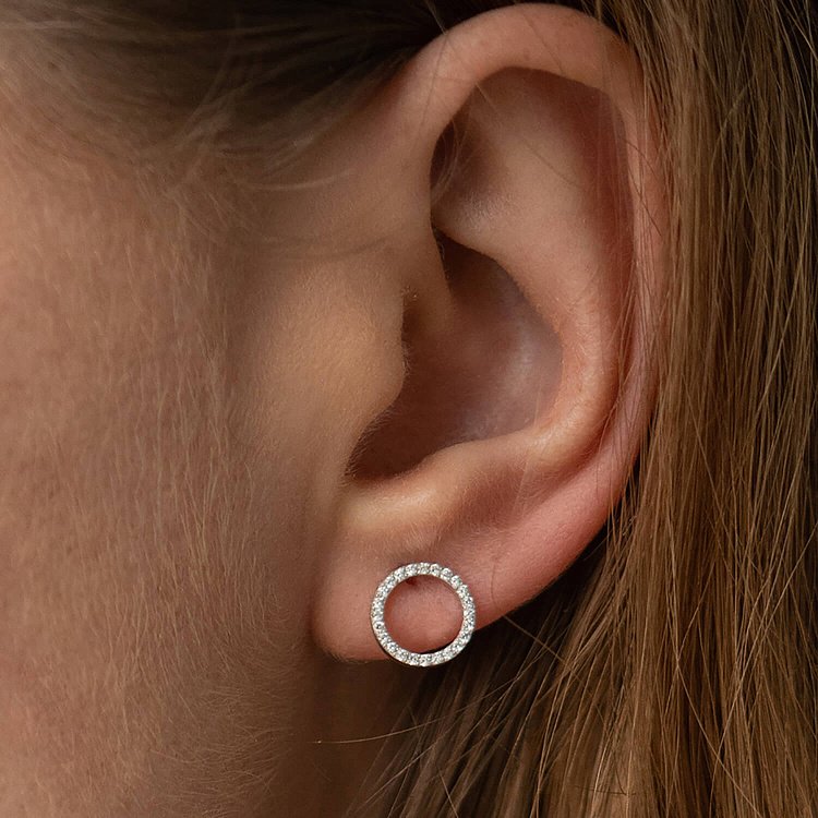 Золоті сережки - пусети "Кругообіг" з діамантами 323311121 від ювелірного магазину Онікс