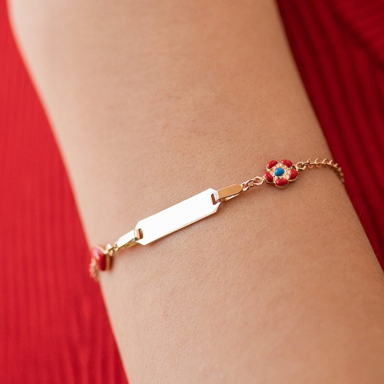 Золотий дитячий браслет "Квіточка та Сердечко" для гравірування з емаллю б03130 від ювелірного магазину Онікс - 1