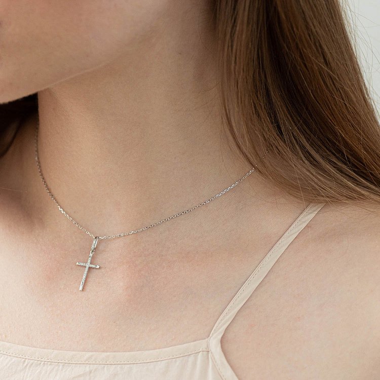 Золотий хрестик з діамантами п313 від ювелірного магазину Онікс - 1