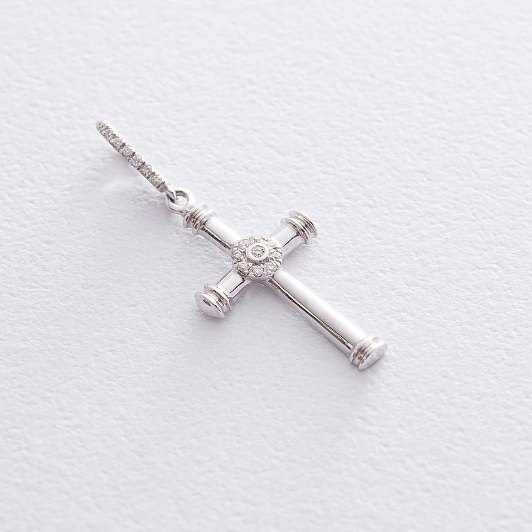 Золотий хрестик з діамантами P001137 Золотий хрестик з діамантами P001137 від ювелірного магазину Онікс