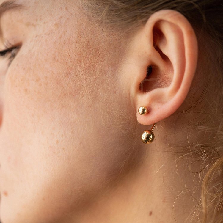 Сережки "Кульки" у жовтому золоті с08424 від ювелірного магазину Онікс - 1