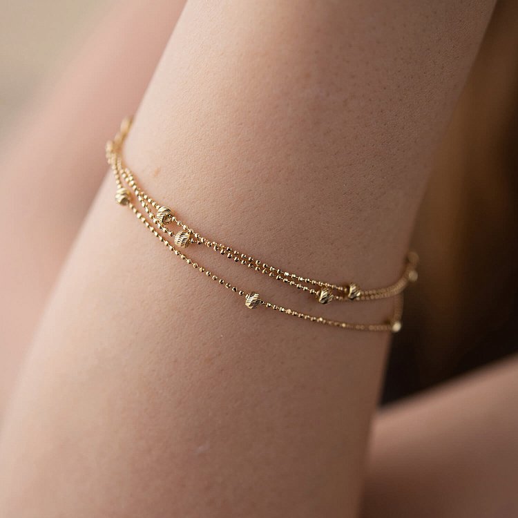 Браслет "Кульки" у жовтому золоті б05256 від ювелірного магазину Онікс - 1