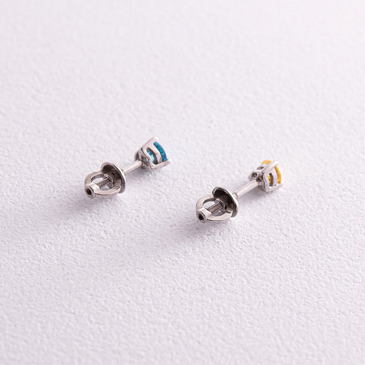 Срібні сережки - пусети (блакитне та жовте каміння) 502 від ювелірного магазину Онікс - 4