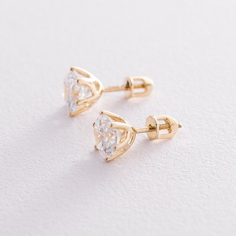 Золоті сережки-пусети з фіанітами с05700 від ювелірного магазину Онікс - 2