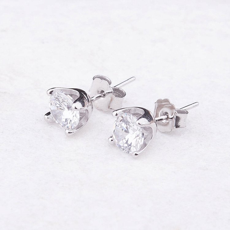 Срібні сережки-пусети з фіанітами 121671 від ювелірного магазину Онікс - 1