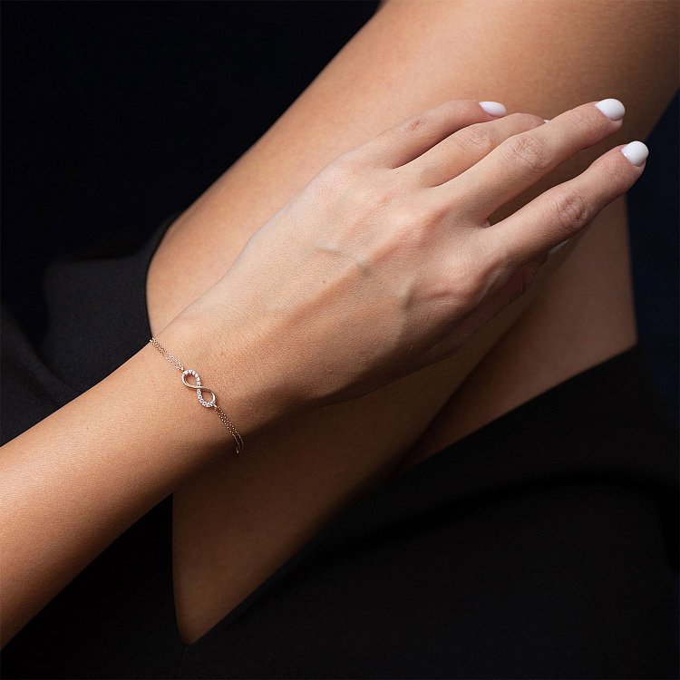 Золотий браслет "Нескінченність" з фіанітами б04544 від ювелірного магазину Онікс - 1