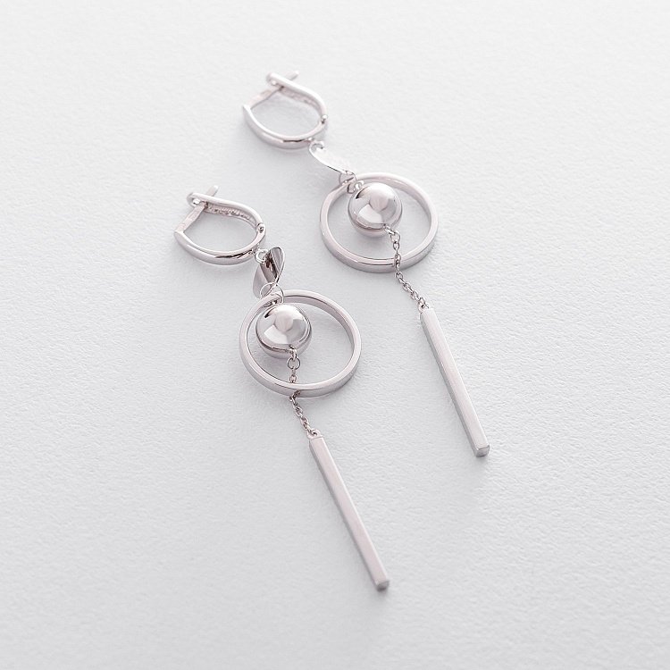 Золотые серьги "Солнце" на английской застежке с05541 от ювелирного магазина Оникс