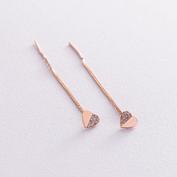 Золотые серьги - протяжки "Сердечки" с фианитами с05188 от ювелирного магазина Оникс