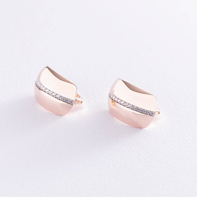 Золоті сережки з білими фіанітами с06838 від ювелірного магазину Онікс