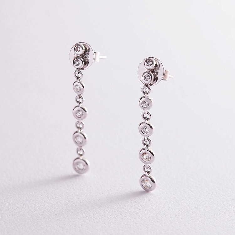 Золоті сережки - пусети з діамантами с306 від ювелірного магазину Онікс