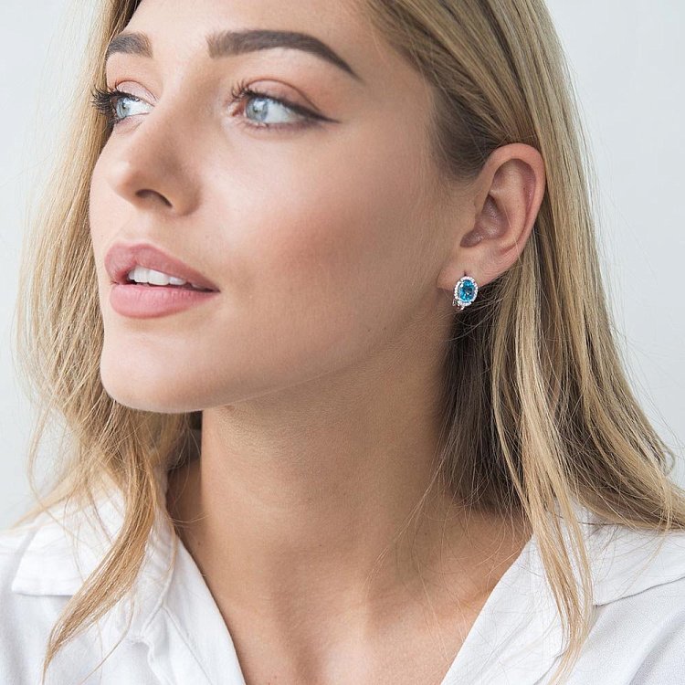 Золоті сережки з блакитним топазом і фіанітами с04682 від ювелірного магазину Онікс - 4