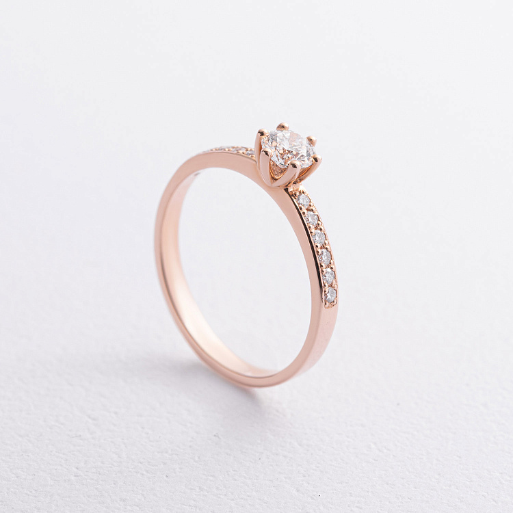 Заручальна золота каблучка з діамантами 28842421 від ювелірного магазину Онікс