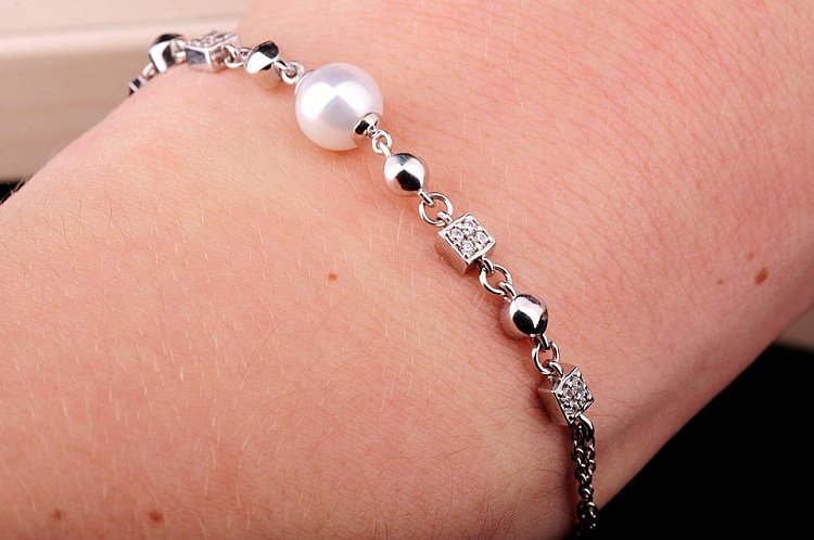 Серебряный браслет с культивированным пресноводным жемчугом 14773 от ювелирного магазина Оникс - 2