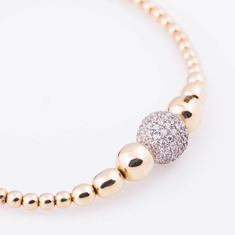 Золотий браслет "Кульки" з фіанітами б02690 від ювелірного магазину Онікс