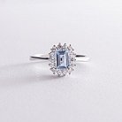 Серебряное кольцо с голубым топазом и фианитами 111461 от ювелирного магазина Оникс