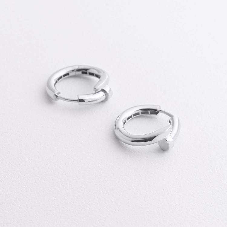 Сережки - кільця "Цвях" у білому золоті с09575 від ювелірного магазину Онікс - 1