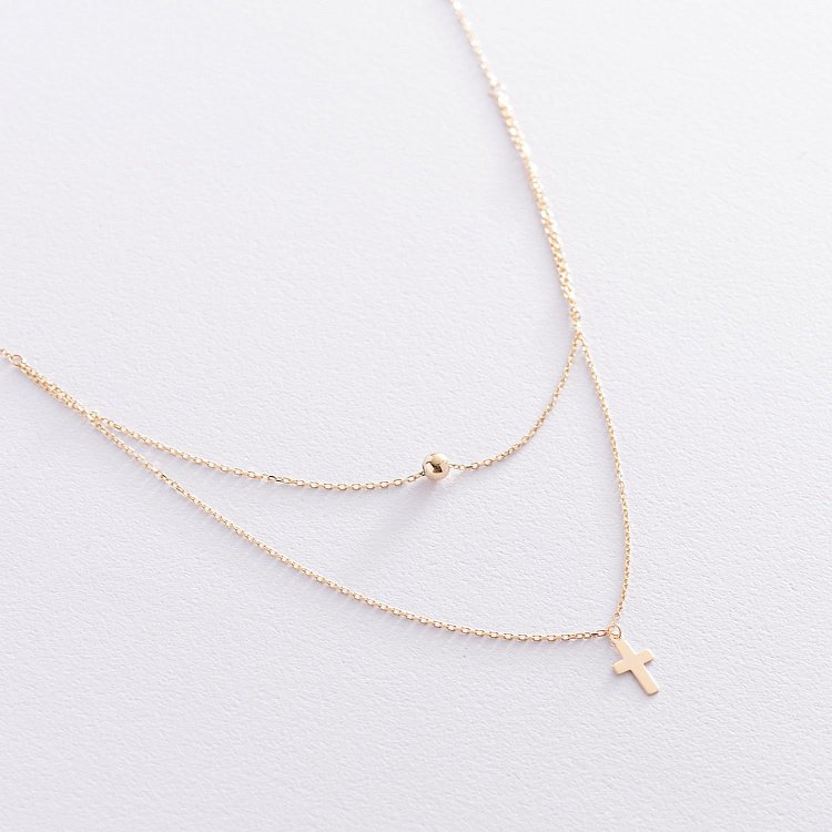 Подвійне золоте кольє "Хрестик і кулька" кол01924 від ювелірного магазину Онікс