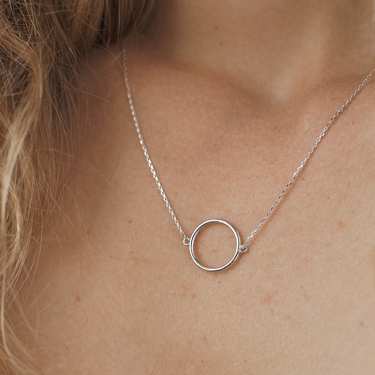 Колье "Круговорот" в белом золоте кол01770 от ювелирного магазина Оникс