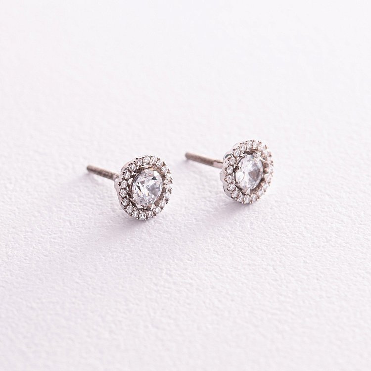 Срібні сережки - пусети 2 в 1 з фіанітами 572 від ювелірного магазину Онікс