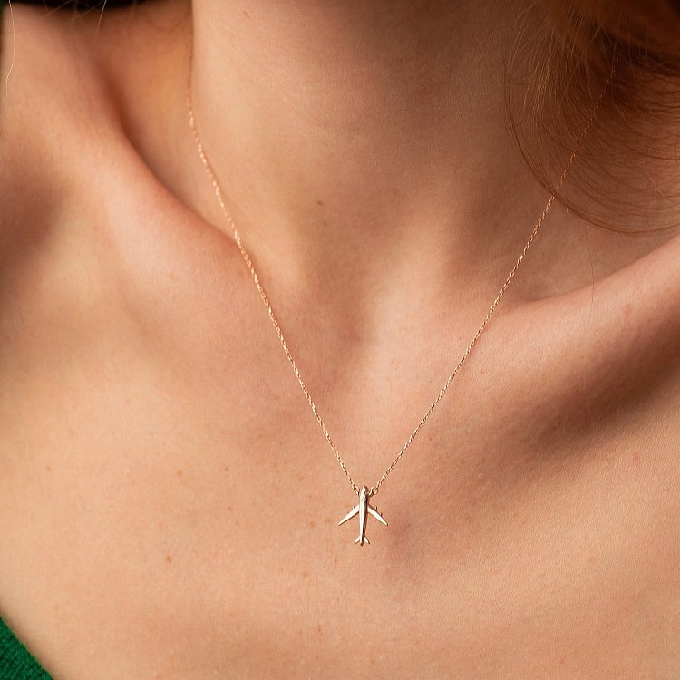 Золоте кольє "Літак" з фіанітом кол02433 від ювелірного магазину Онікс - 1