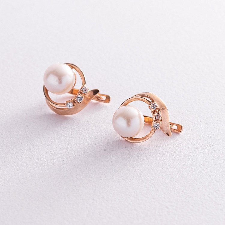 Золоті сережки з фіанітами і перлами с01636 від ювелірного магазину Онікс