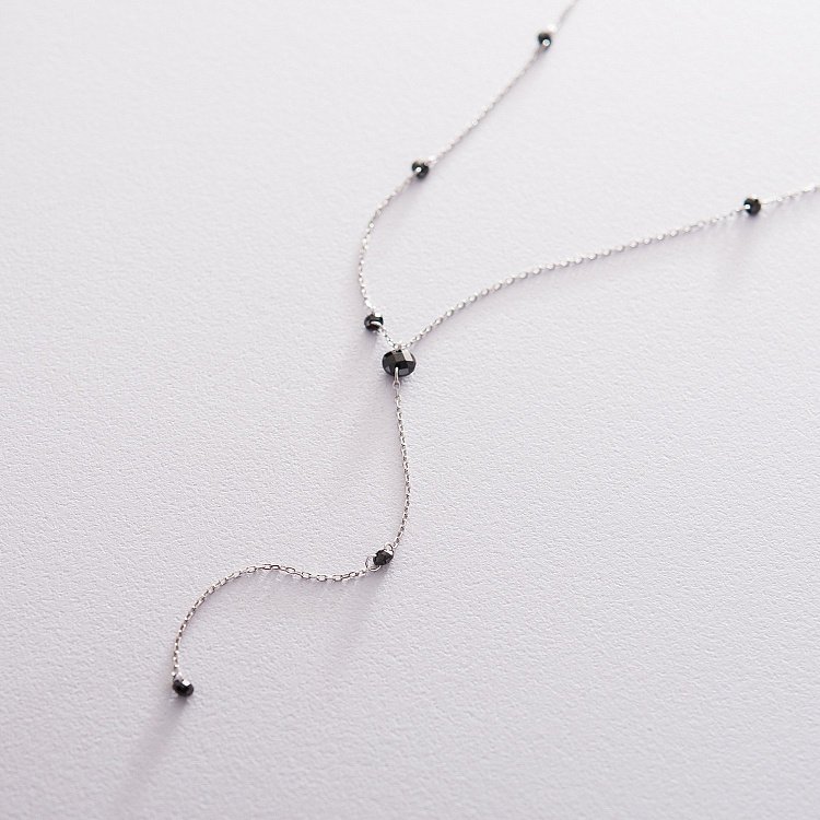 Серебряное колье с черными камнями 18906 от ювелирного магазина Оникс