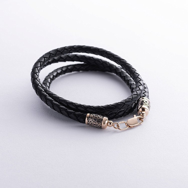 Кожаный шнурок с золотыми вставками кол01423 от ювелирного магазина Оникс