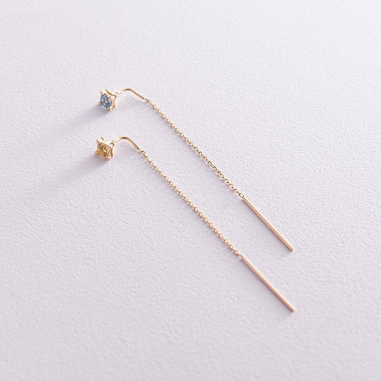 Сережки - протяжки у жовтому золоті (блакитні та жовті фіаніти) с08123 від ювелірного магазину Онікс