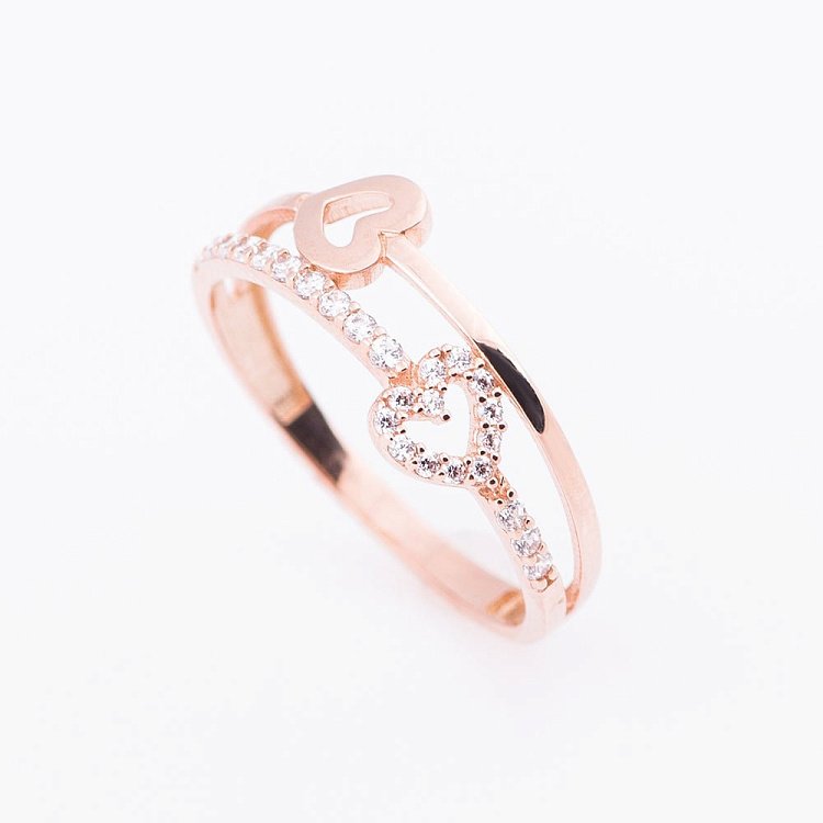 Золота каблучка "Серця" з фіанітами к05140 Золота каблучка "Серця" з фіанітами к05140 від ювелірного магазину Онікс