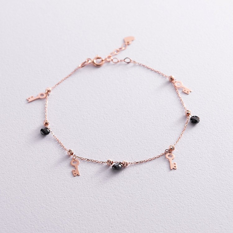 Золотой браслет "Ключики" (фианиты) б04881 от ювелирного магазина Оникс