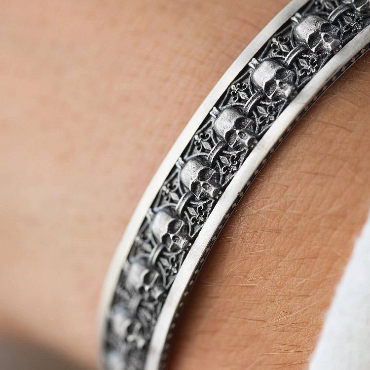 Чоловічий срібний браслет з черепами 1225 від ювелірного магазину Онікс - 3