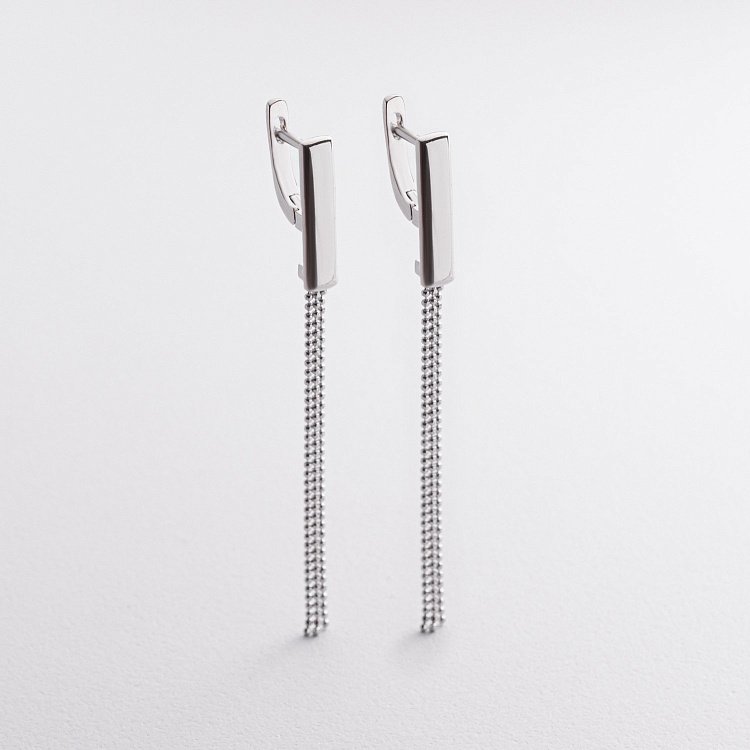 Срібні сережки з ланцюжками 123481 Срібні сережки з ланцюжками 123481 від ювелірного магазину Онікс