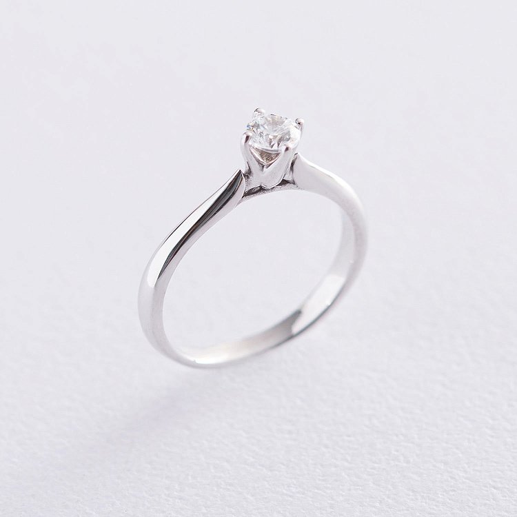 Золота заручальна каблучка (куб. цирконій Swarovski) к06267 Золота заручальна каблучка (куб. цирконій Swarovski) к06267 від ювелірного магазину Онікс