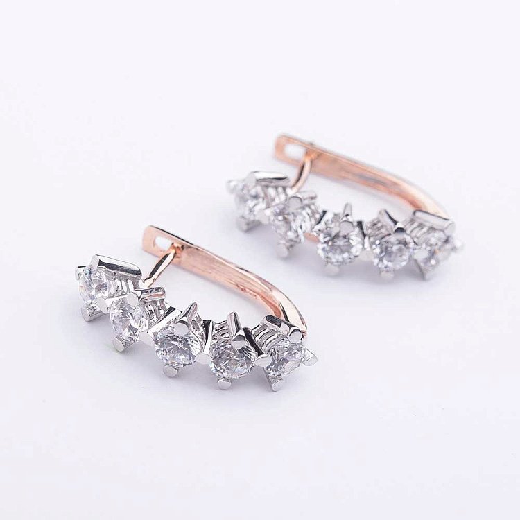 Золоті сережки з фіанітами с04120 від ювелірного магазину Онікс