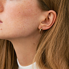 Сережки - пусети "Цвях" у жовтому золоті (фіаніти) с09174 от ювелирного магазина Оникс - 1