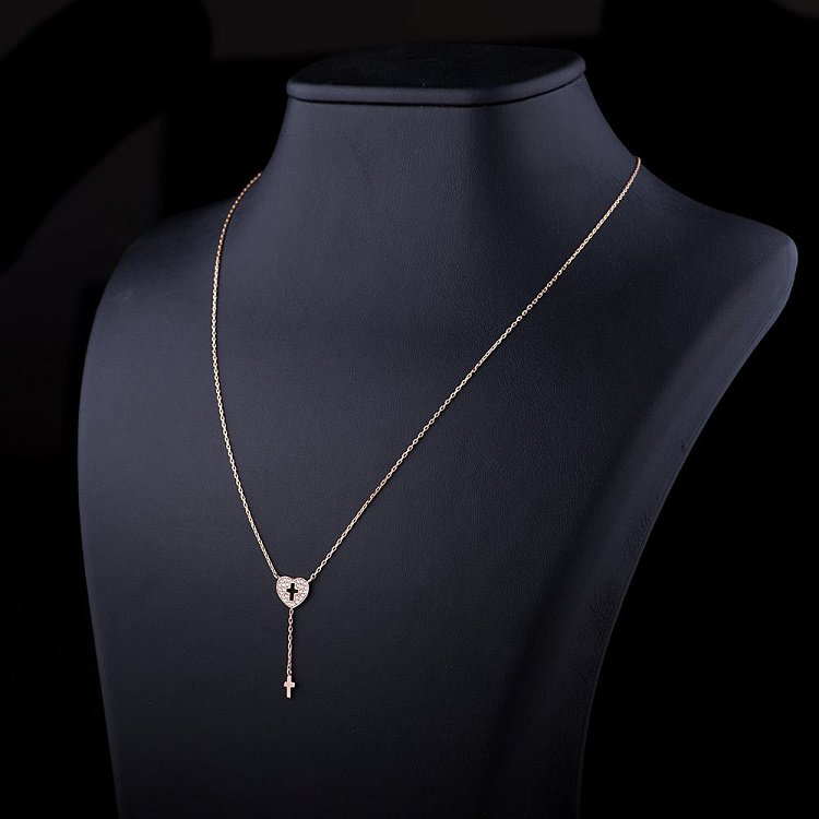 Золоте кольє "Сердечко з хрестиком" кол01049 від ювелірного магазину Онікс - 1