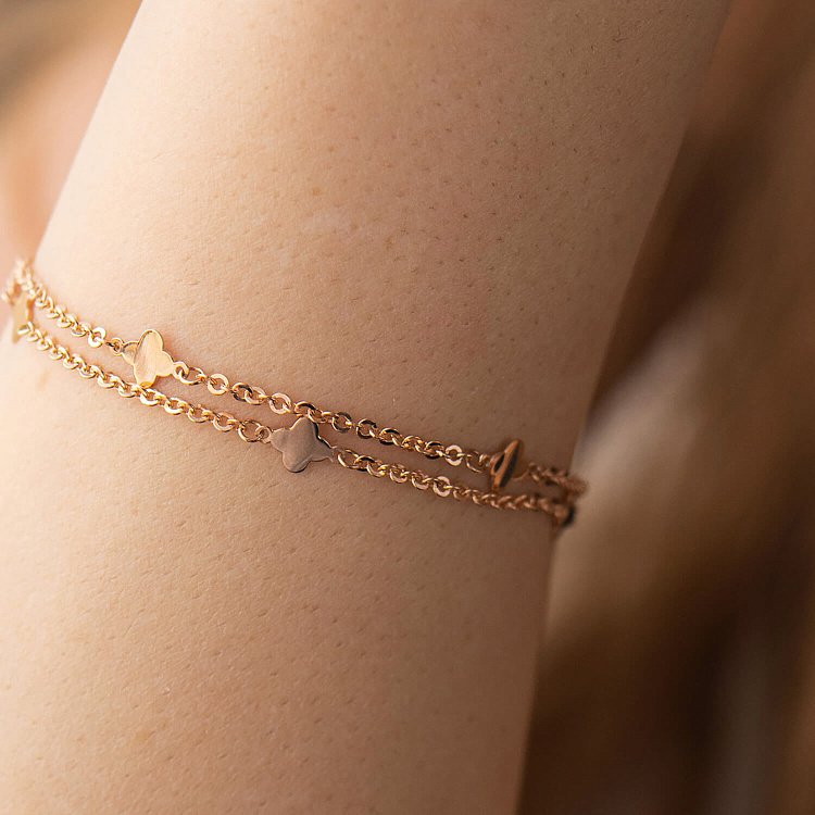 Подвійний браслет "Конюшина" у червоному золоті б05199 від ювелірного магазину Онікс - 1