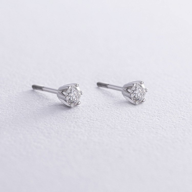 Золоті сережки - пусети з діамантами 327371121 від ювелірного магазину Онікс