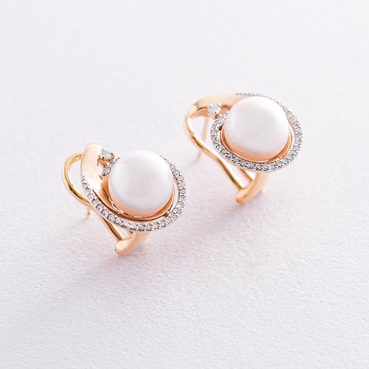 Золоті сережки з діамантами і перлами с1098 від ювелірного магазину Онікс