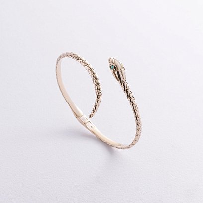 Жорсткий браслет "Змія" у жовтому золоті (смарагди) бб0044м