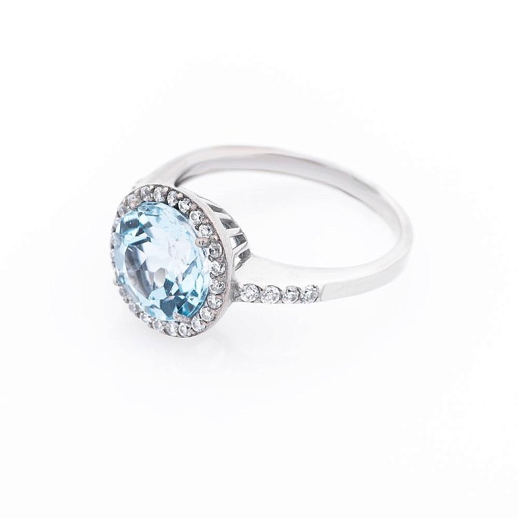 Заручальний срібний перстень (блакитний топаз, фіаніти) 111692 від ювелірного магазину Онікс - 1
