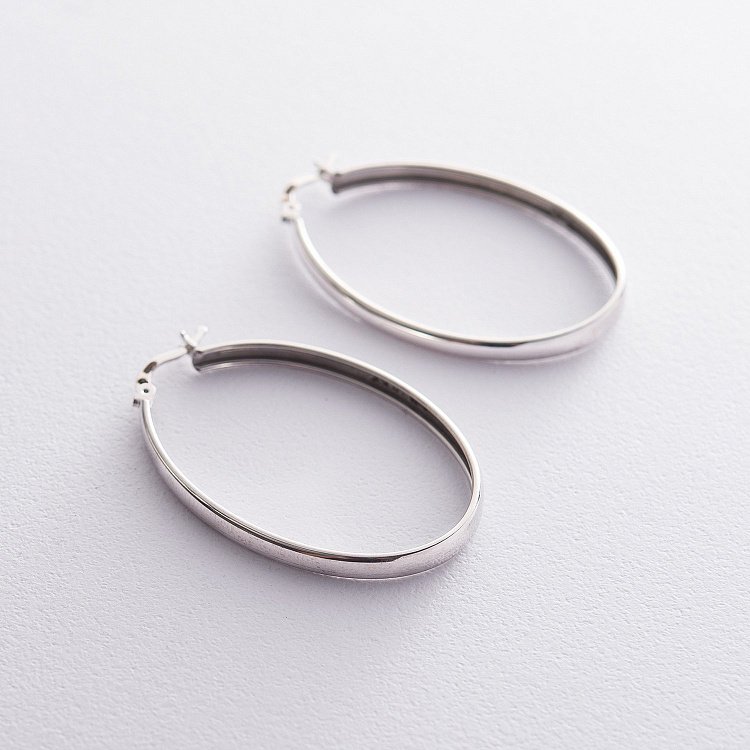 Срібні сережки Овальні 122582 від ювелірного магазину Онікс