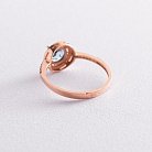 Золотое кольцо с голубым топазом и фианитами к04626 от ювелирного магазина Оникс - 1