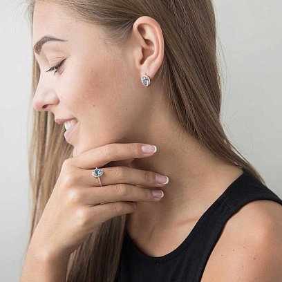 Золота каблучка з блакитним топазом і фіанітами к04653 №2