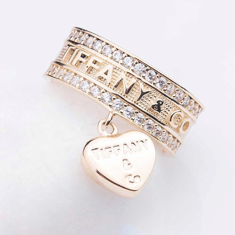 Золота каблучка з фінаітамі к04273 від ювелірного магазину Онікс