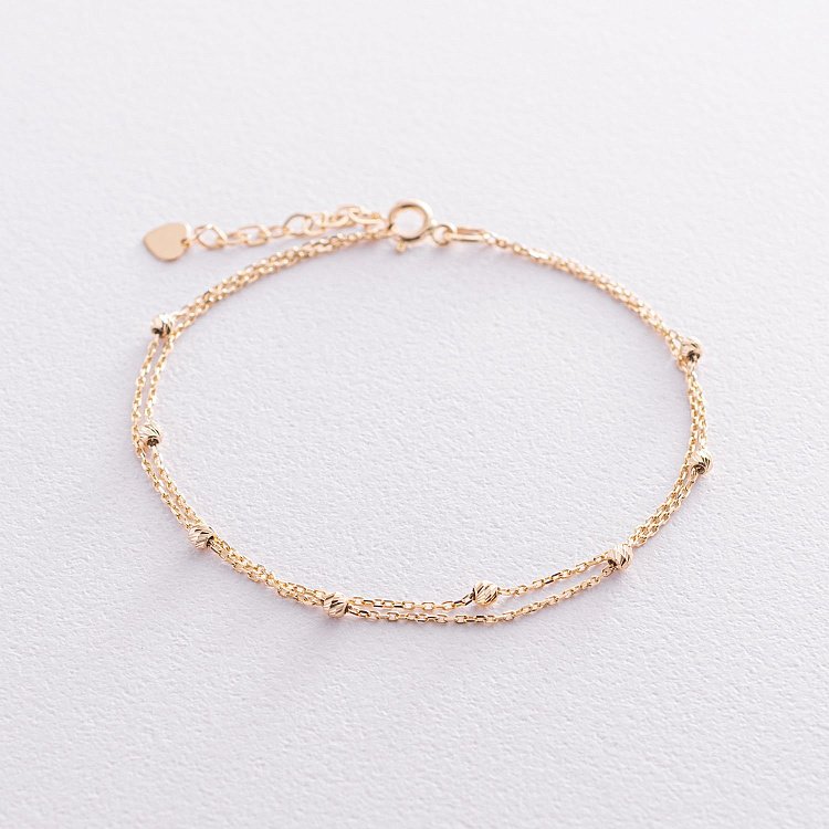 Подвійний браслет "Кульки" в жовтому золоті б04706 від ювелірного магазину Онікс - 5