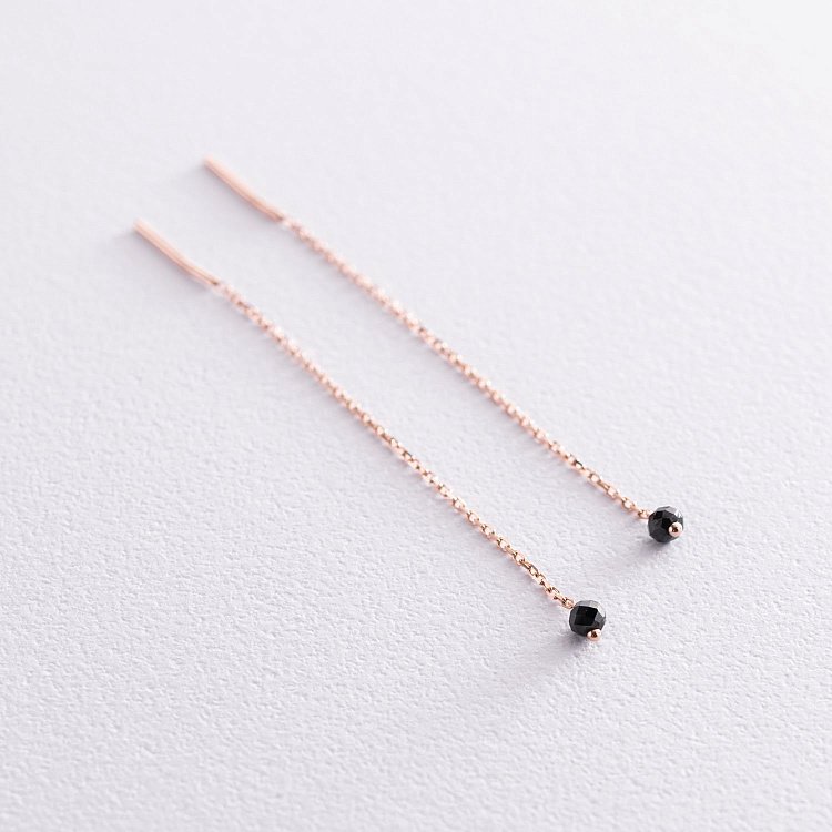 Золоті сережки - протяжки (чорні фіаніти) с07198 від ювелірного магазину Онікс